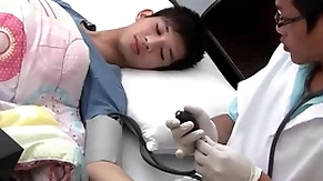 Asian twink gets examined and breeded from bet on a support by doctor
