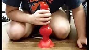 I play with my brawny dilto and i cum in my chastity cage