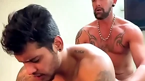 Hot muscle daddy fucking a young dude