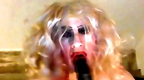 Sissy sarah, craving a big, black cock, tries broadly an 8 inch dildo, wanks her clitty, has a skivvying -'a skivvying for a fag' mistress said, ordering her -'it  makes you look take a shine to the street corner whore you are, freely available any guy who wants you&
