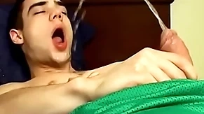 Adorable jock zack randall pees and cums on his smooth body