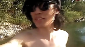 Jon arteen is this slim asian twink boy dancing a musical strip-tease on the river smiling showing his full pubes doing alfresco gay porn with a sneaker and underwear charm