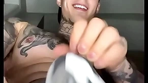 Jakipz with a musician strap playing with his bulge and cumming